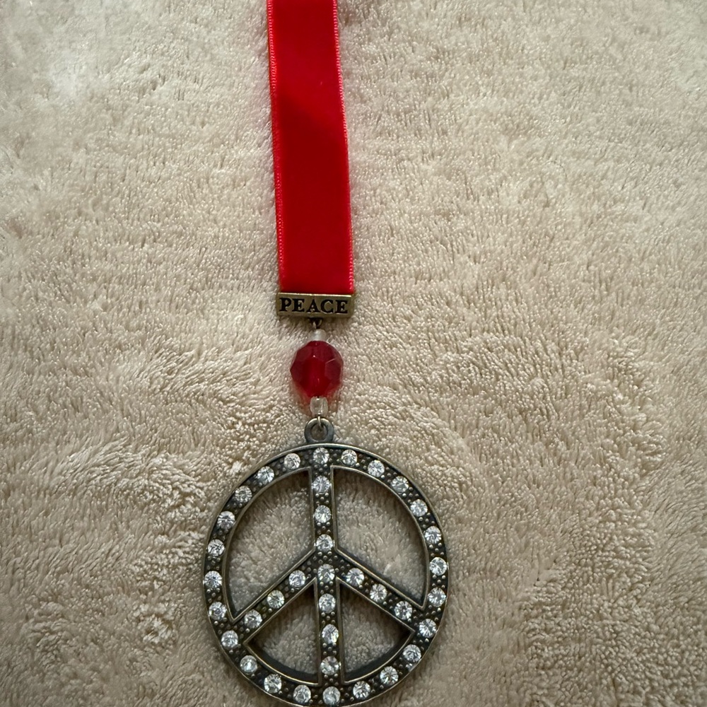 Grasslands Road Peace Ornament with Red Ribbon